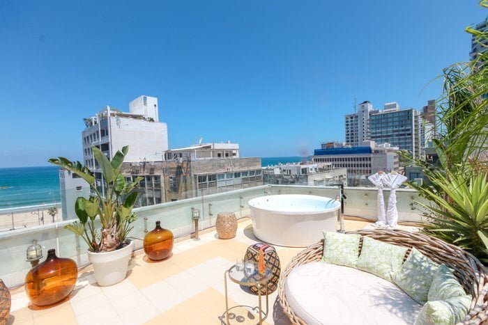 Brown-Beach-Hotel-Terrace-View-Full-Mademoiselle-Travel