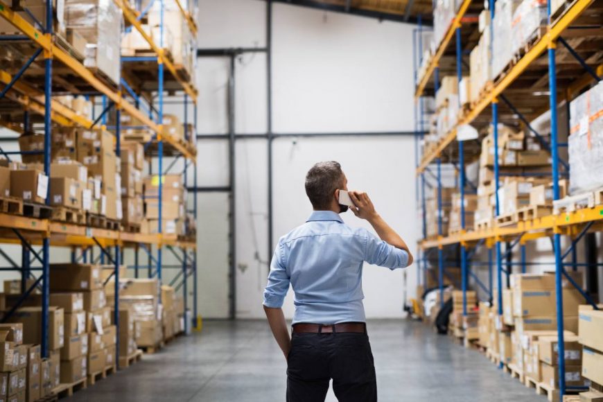 photodune b0cylqr3 warehouse worker or supervisor with a smartphone xxl