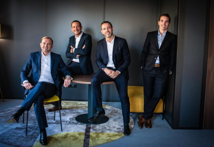 Olivier Liot, à gauche, co-fondateur de la Family office Norman K entouré de son équipe